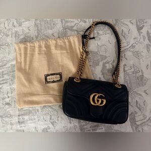 Genuine leather bag with gold accents